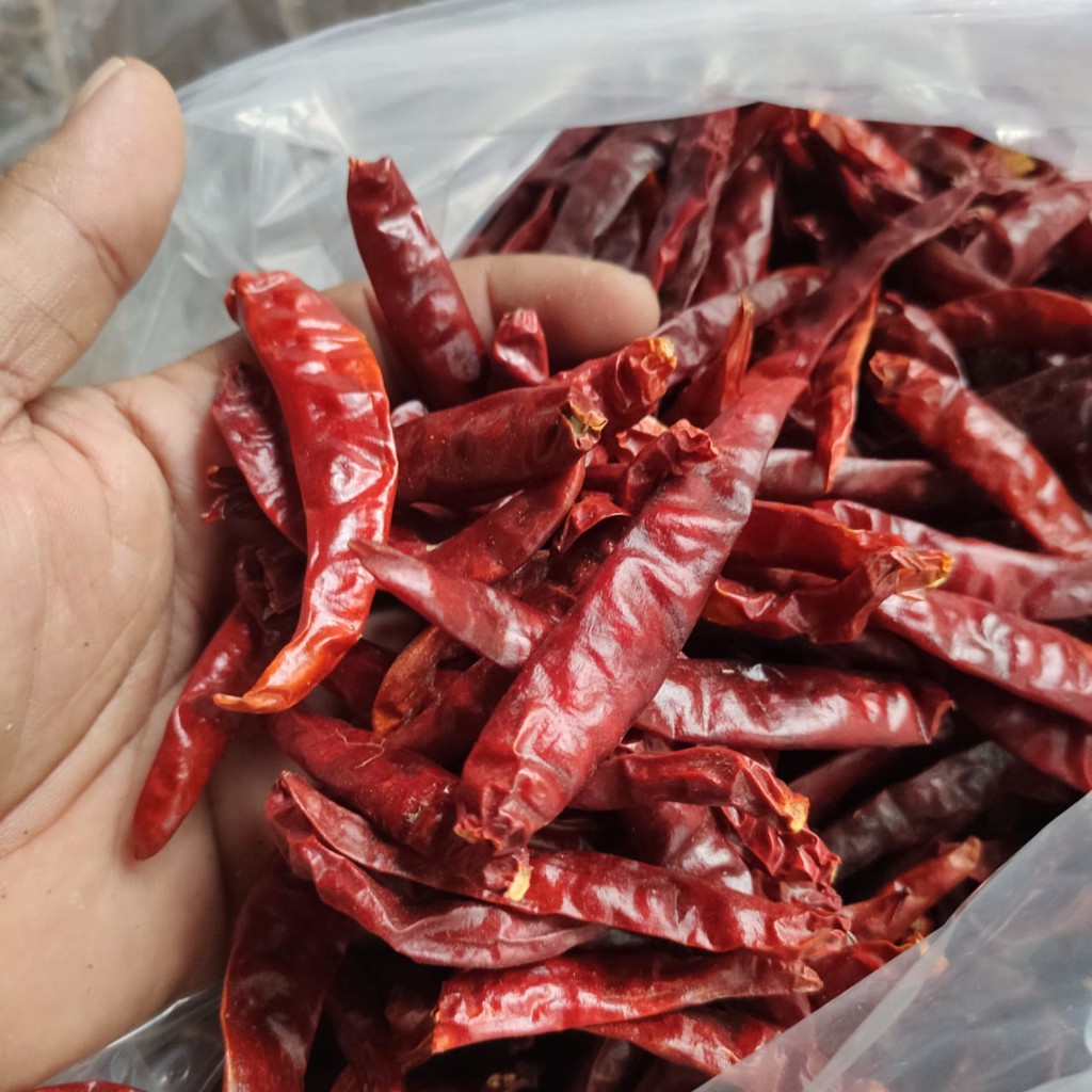 

Cabe Merah Kering Jenis Teja cabe merah keriting teja Pedas Bumbu Packing 100gr