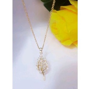 kalung titanium daun gold mata cantik 94050