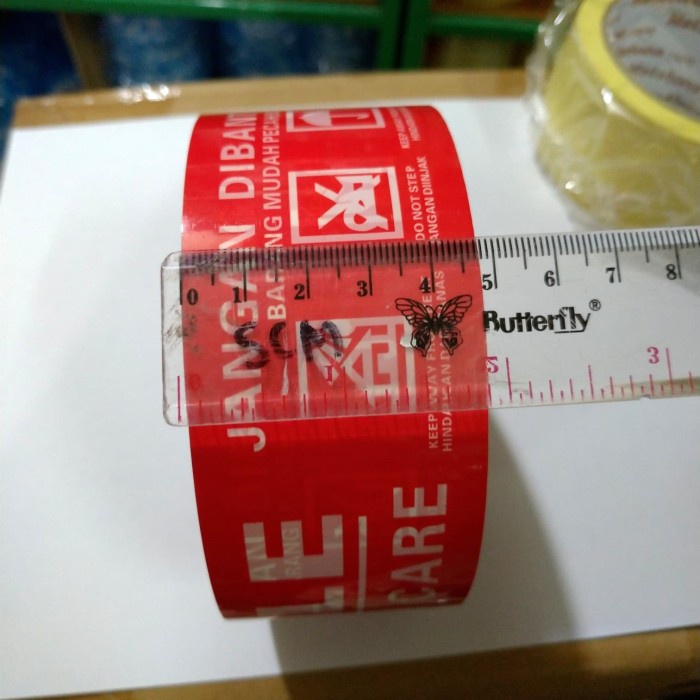 

perekat-pengikat- lakban fragile merah 100 meter x 48 mm jangan dibanting lakban segel -pengikat-