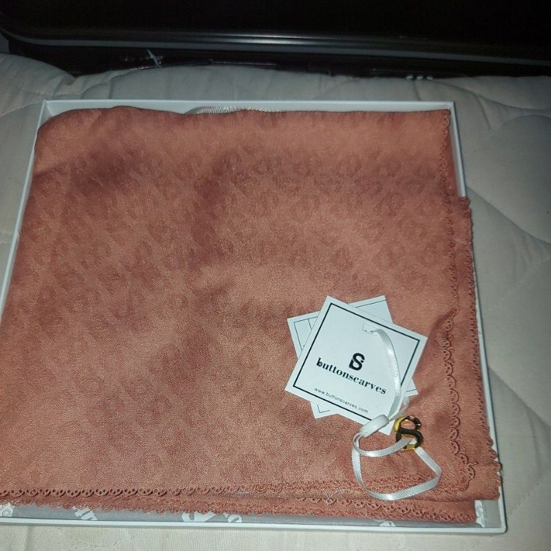 tapis embossed cantaloupe buttonscarves