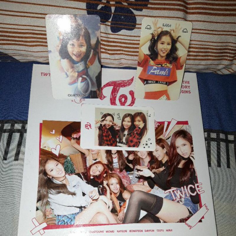 ALBUM TWICE THE STORY BEGINS & TCL XMAS, PC & CD only WIL