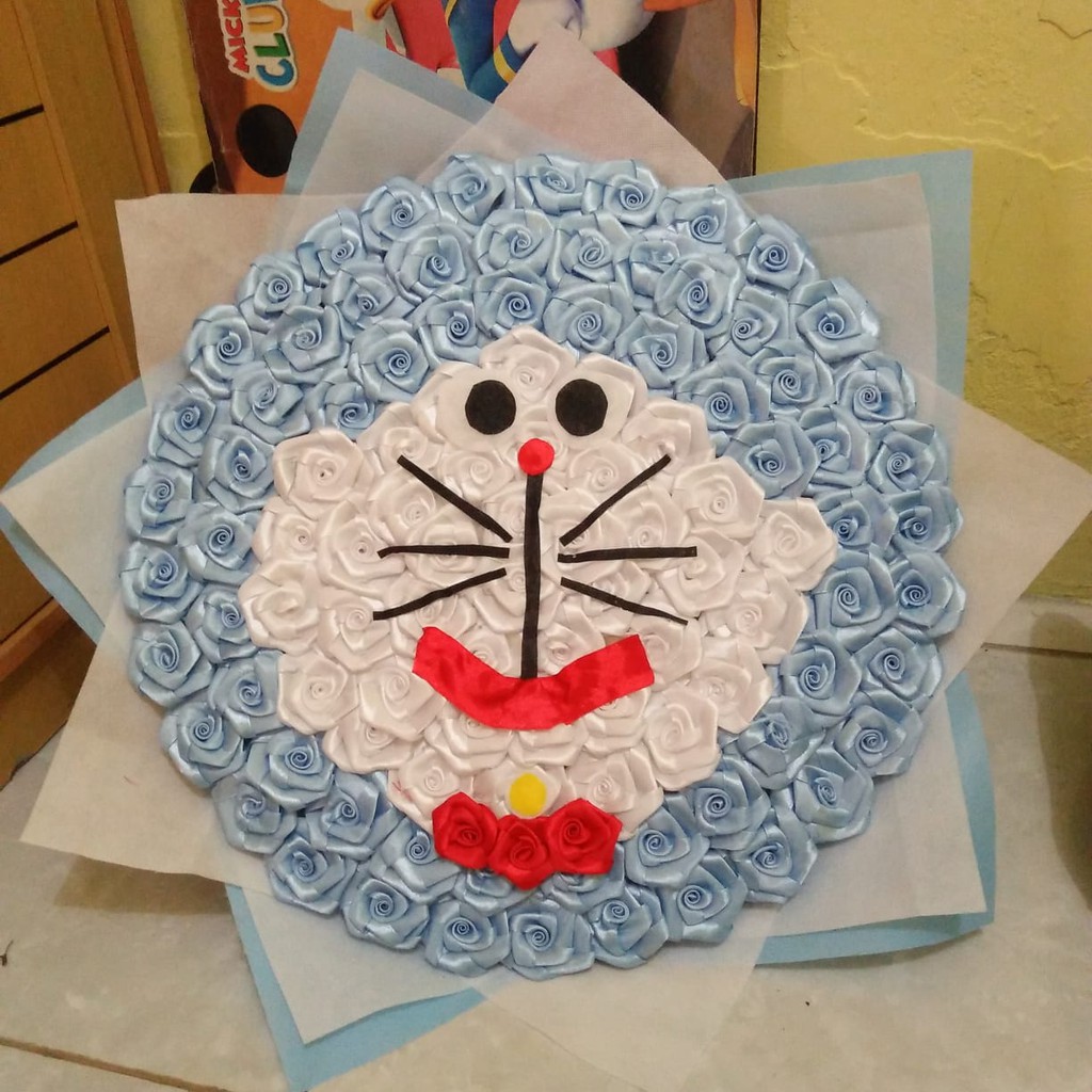 bunga doraemon/buket doraemon/bucket boneka/ Buket Wisuda /bouquet boneka/buket jogja /bunga boneka