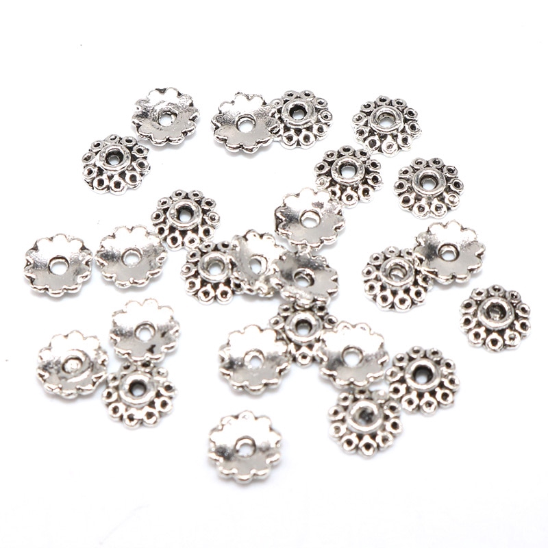 100 / 200 Pcs Manik-Manik Spacer Bahan Alloy Motif Bunga Ukuran 5mm