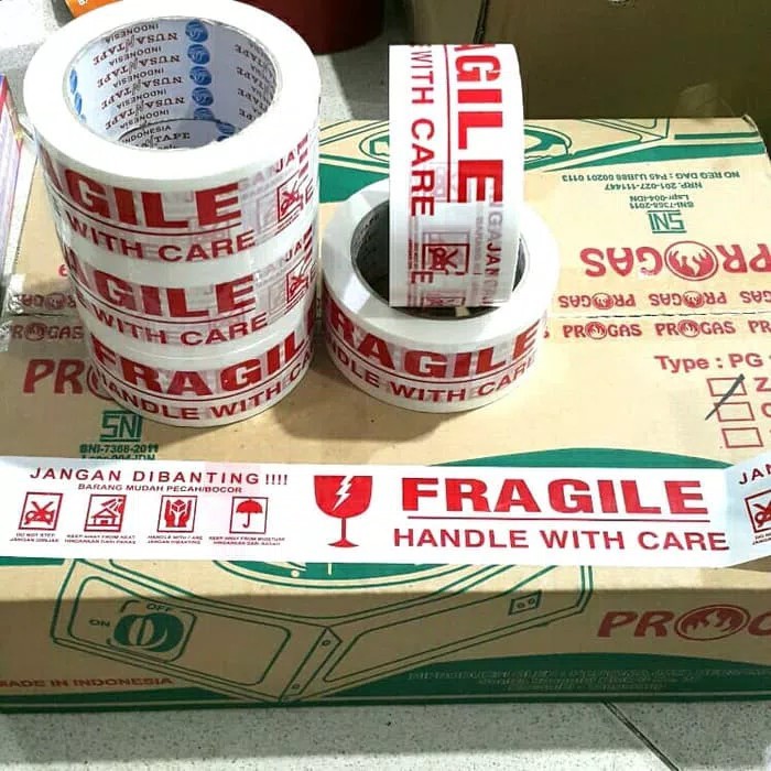 

Promo LAKBAN FRAGILE PUTIH KOMBINASI JANGAN DIBANTING NEW !! 100 YARD GROSIR Berkualitas