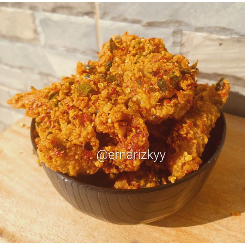 

KERIPIK KULIT AYAM [ 50 gr ] PEDAS DAUN JERUK/ Halal