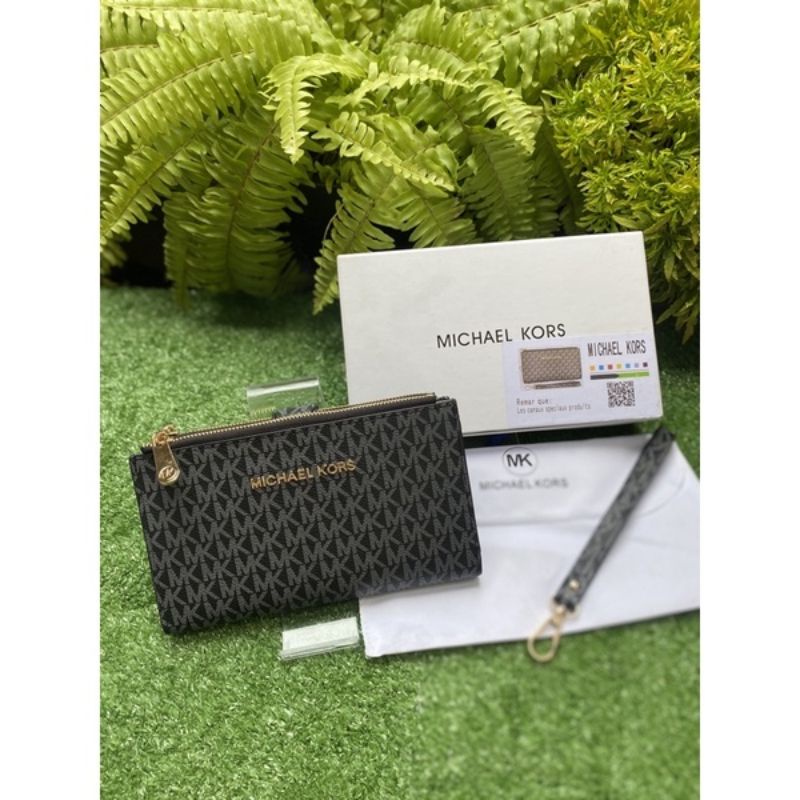 RIZKI2PUTERA DOMPET HP PREMIUM MK