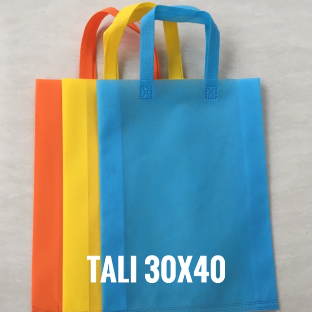 

GOODIE BAG TALI LIPAT SAMPING 30x40 (tas souvenir promosi pameran spunbond)