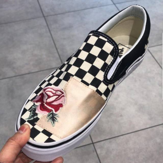 vans slip on checkerboard with rose