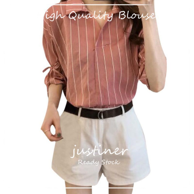 Blus Lengan Setengah dengan Motif Garis Garis dan Hiasan Blus Lengan Setengah dengan Motif Garis Garis dan Hiasan