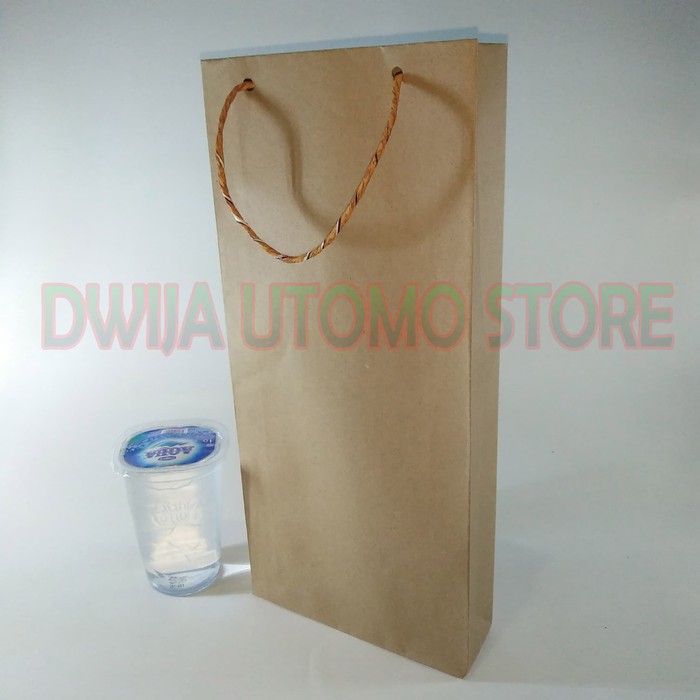 

Paperbag, Tas Kertas Kraft Coklat ukuran 14x5x32 per pack (100pcs)