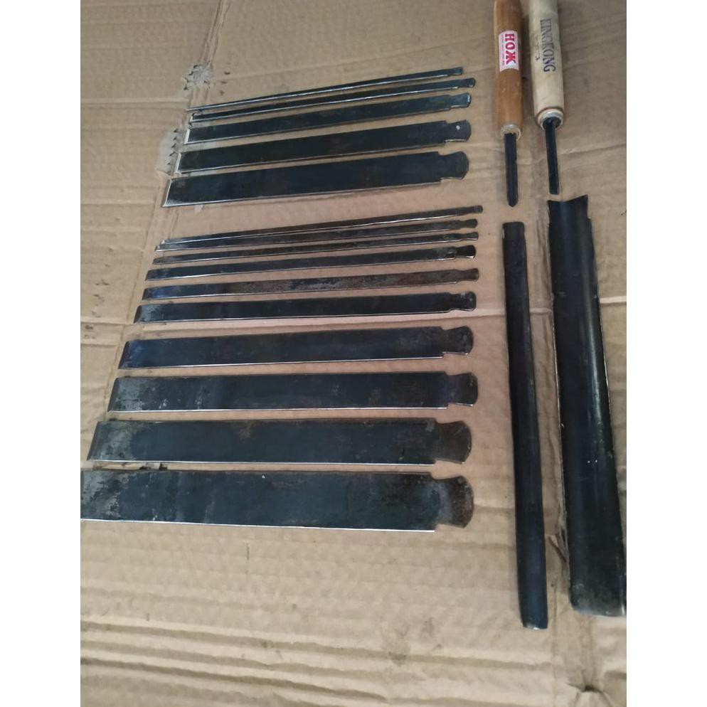 pahat tatah ukir baja minimalis