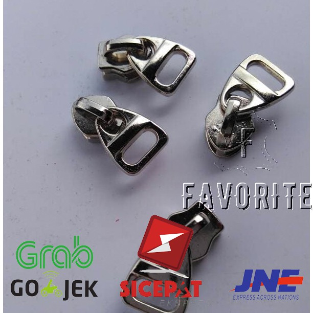 Kepala Resleting Untuk Rel Plastik No 5 Segitiga Nikel Puller Silver Hrg = Rp. 350 Minimal 100pcs