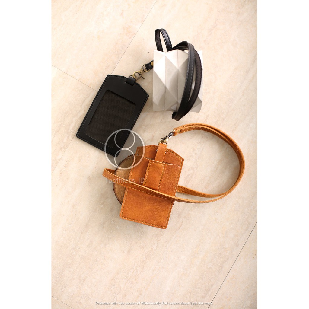 

ID Card Patuk Kalung Premium Badge Leather Clip Warna Coklat dan Hitam Kalung Premium ID Badge Leather Clip Gantungan Magnet Identitas