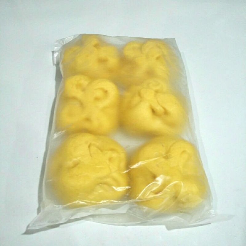

BAPAU LABU KUNING ISI KAKI JAMUR OLAHAN, ISI 6PCS, (FROZEN FOOD), CUAN IK