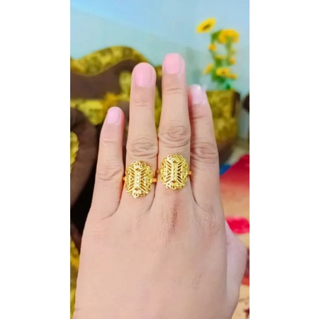 kalung ,cincin motif pintu Aceh (kalung+liontin) dan bisa jadi Bros cantik,awet,mewah