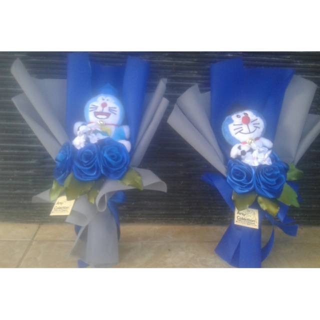 Buket boneka doraemon|kado ulang tahun bunga 3 tangkai