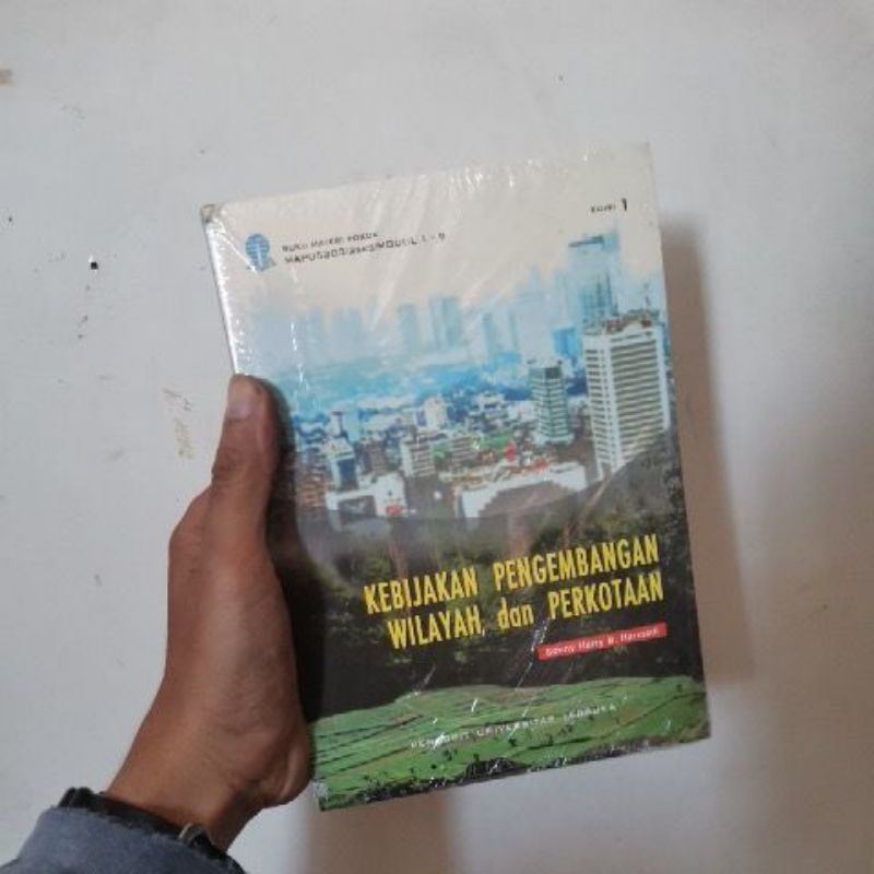 

Buku Kebijakan pengembangan wilayah dan perkotaan