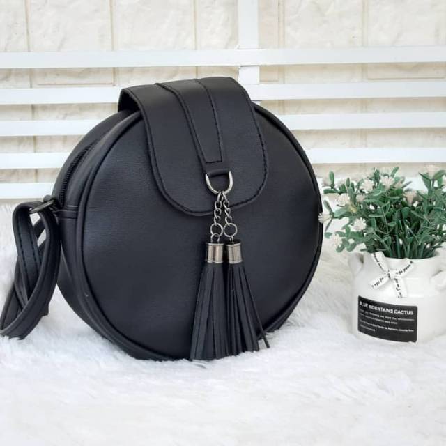 Tas bulat miniso