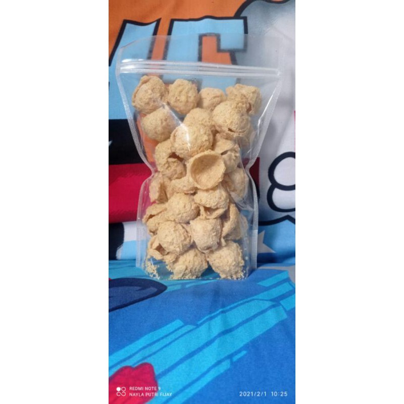 

KERUPUK TAHU / KERUPUK TAHU BULAT 130gr