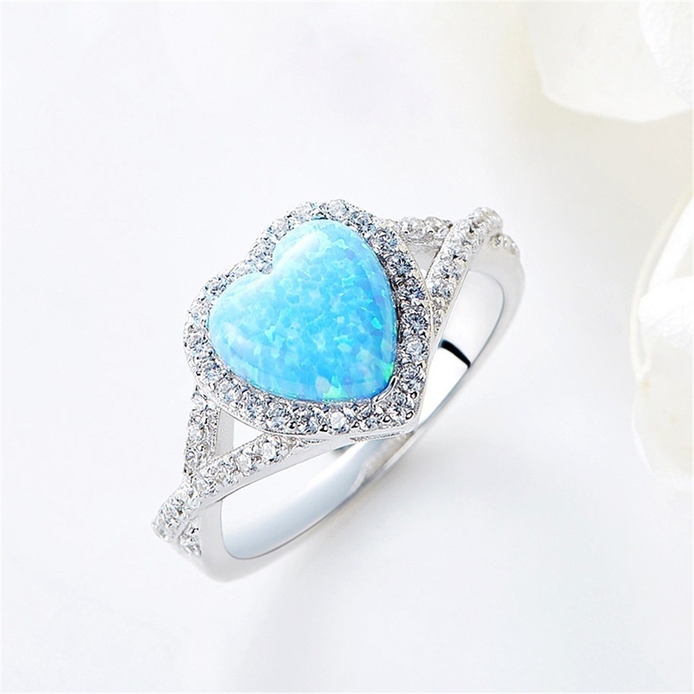 New blue heart-shaped opal inlaid zircon ring