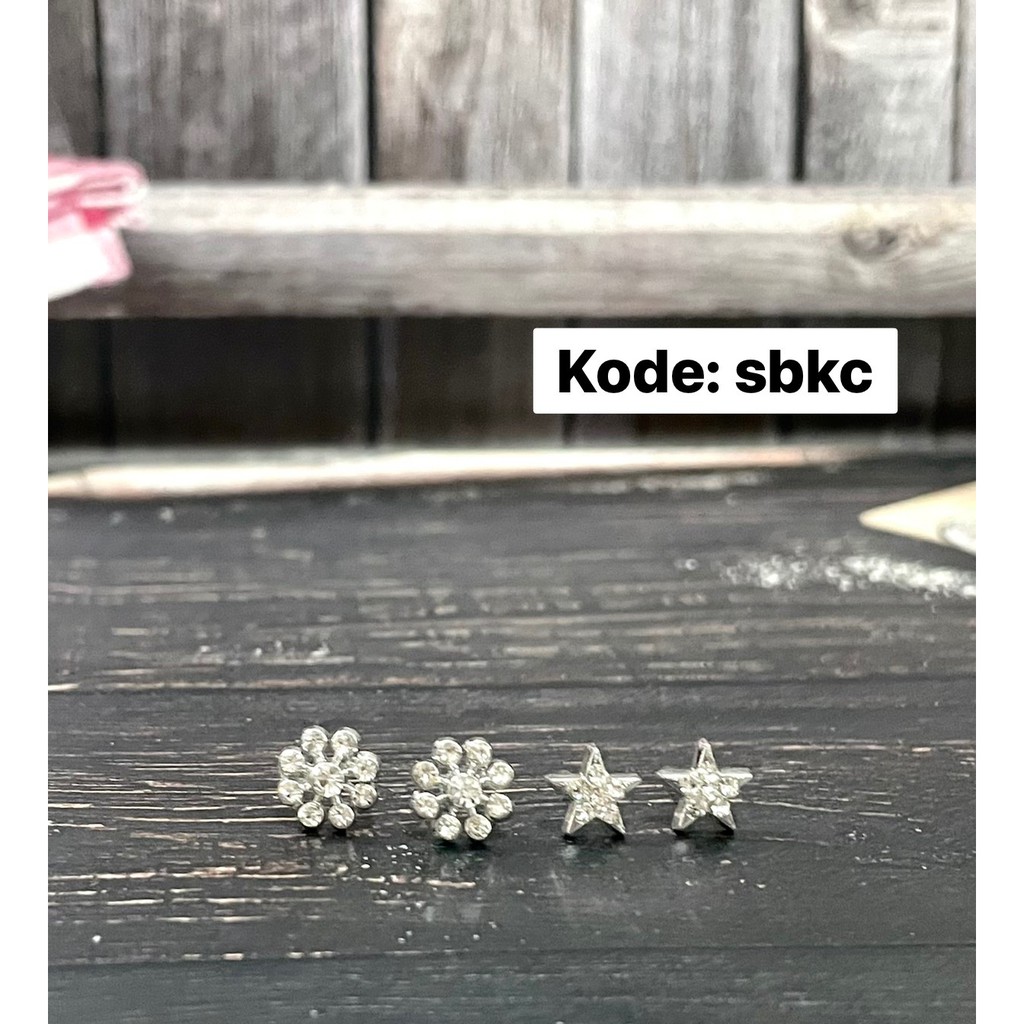 anting plastik silver star permata / bunga permata sbkc