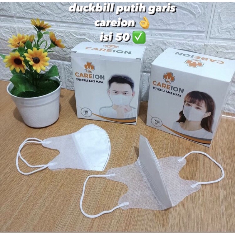 MASKER DUCKBILL CAREION PUTIH ISI 50PCS MURAH