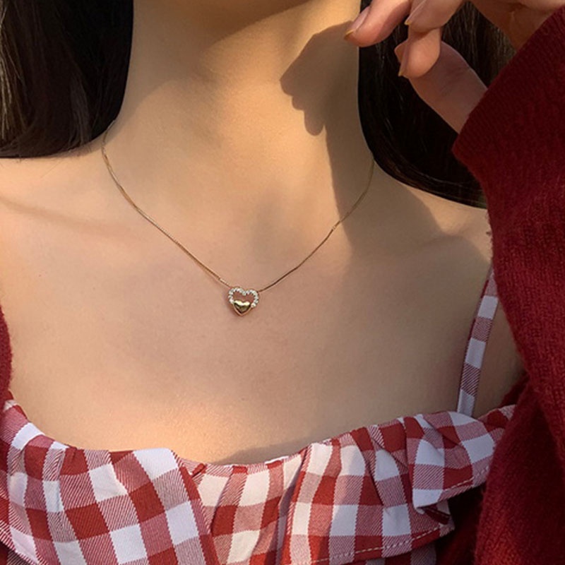 Kalung Liontin Bentuk Hati Hollow 18k Bahan Zircon Tahan Air Untuk Wanita