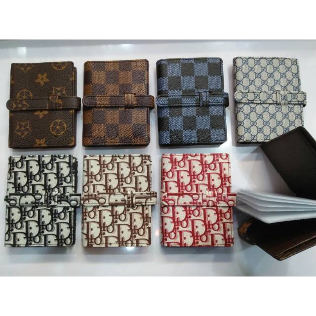 Dompet kartu tusuk album