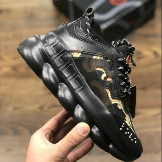 all black chain reaction versace