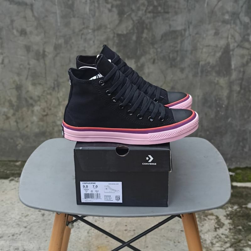 black and pink high tops