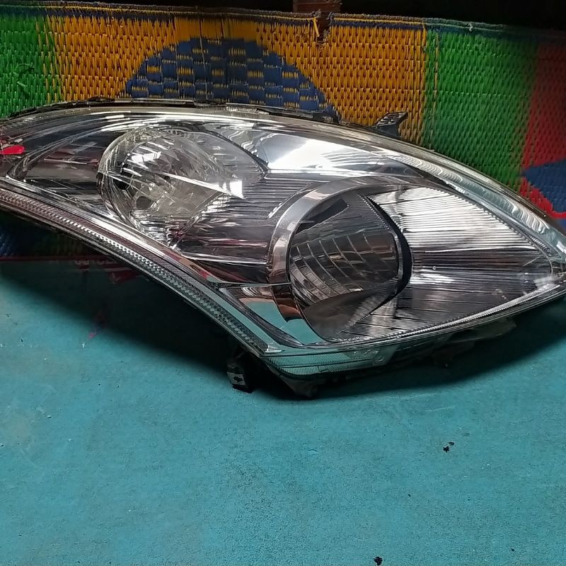 headlamp Suzuki Swift 2012