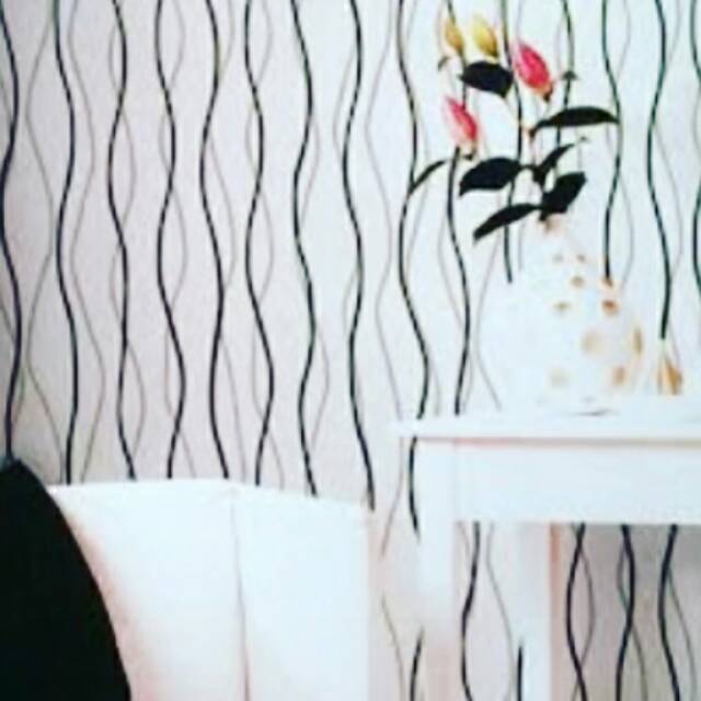 Roll cat motif dinding bermotif