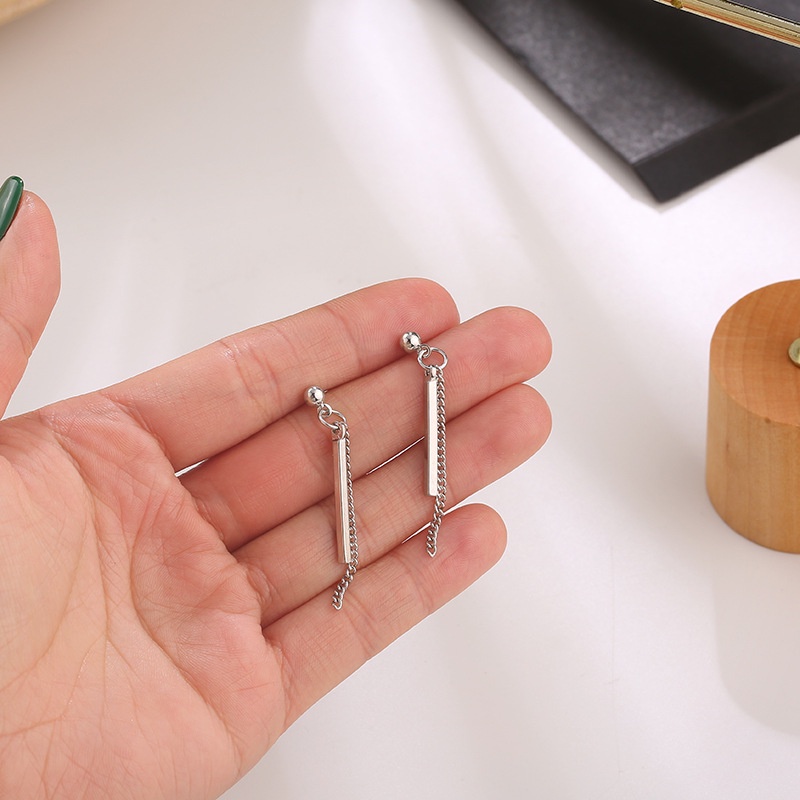 We Flower Anting Rantai Rumbai Menjuntai Desain Bunga Warna Silver Gaya Minimalis Untuk Wanita