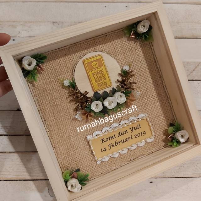 Frame mahar khusus logam mulia