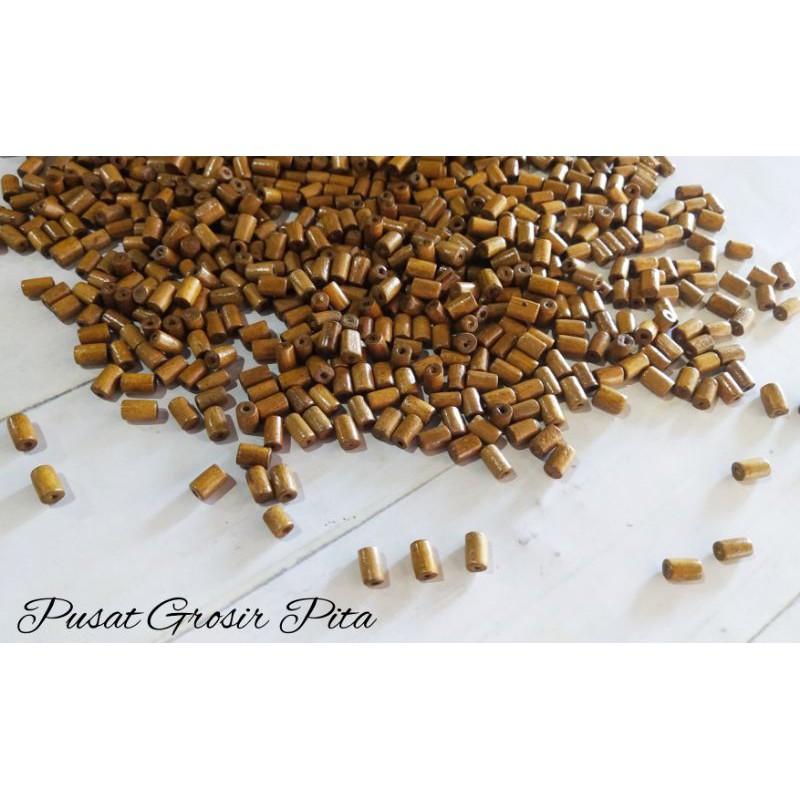 50 gram Mote Kayu Tabung Besar 8 mm | Pusat Grosir Pita | PGP
