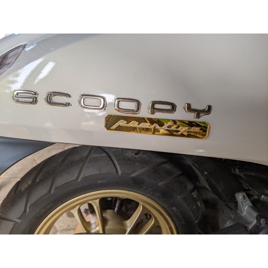 Emblem Prestige Scoopy 2021