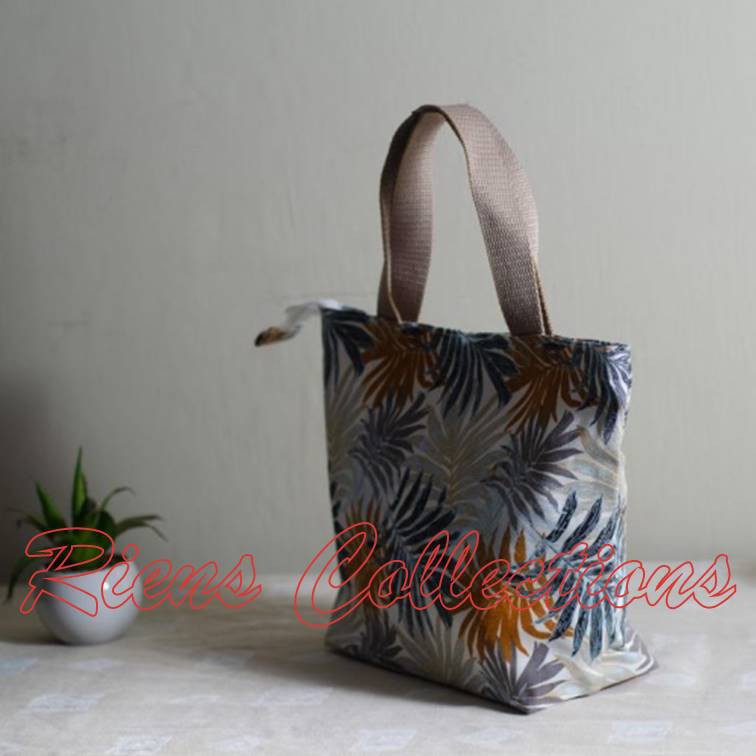 RIENS COLLECTIONS. HANDBAG BESAR KANVAS MOTIF FLORAL PALM ORANGE