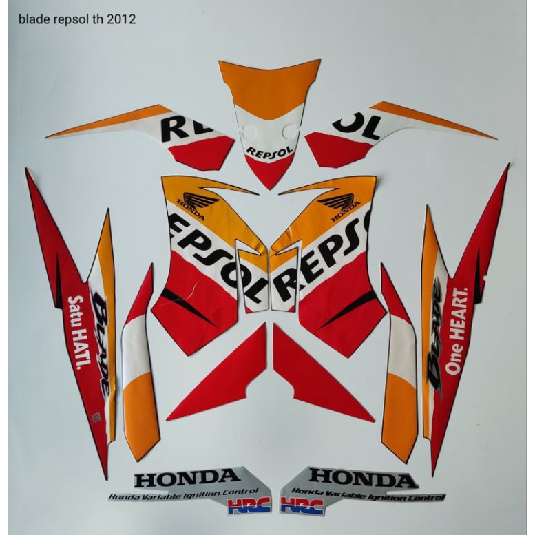 striping ORI Honda BLADE Repsol th 2012 warna merah kuning