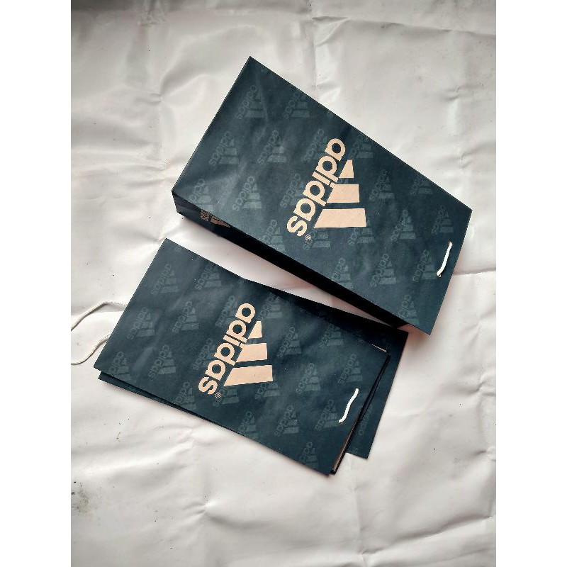 

papper bag sandal adidass papper bag sandal papper bag sepatu isi 20 pcs 1 kodi papper bag sendal papper bag sandal slip on papper bag sandal selop