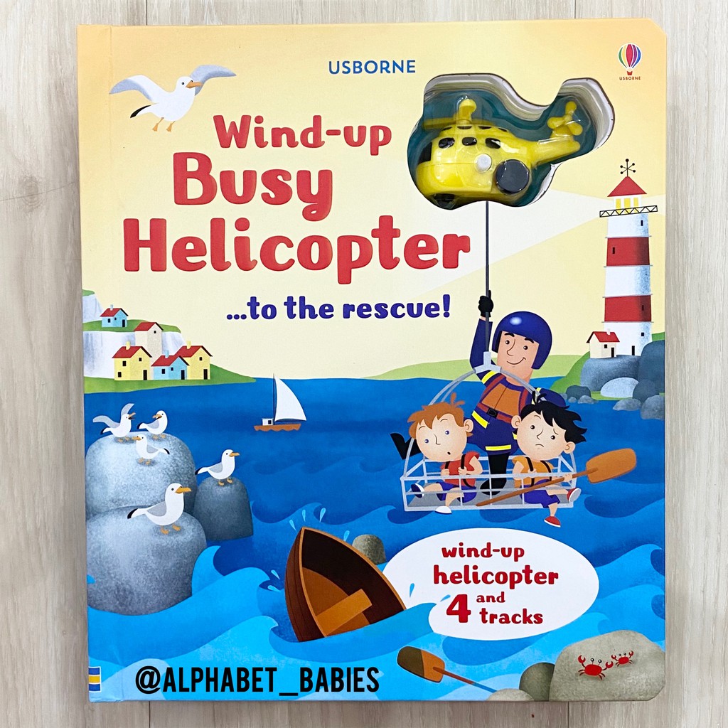 Usborne Wind-Up Busy Helicopter.. To The Rescue ( Helicopter and 4 Tracks)
