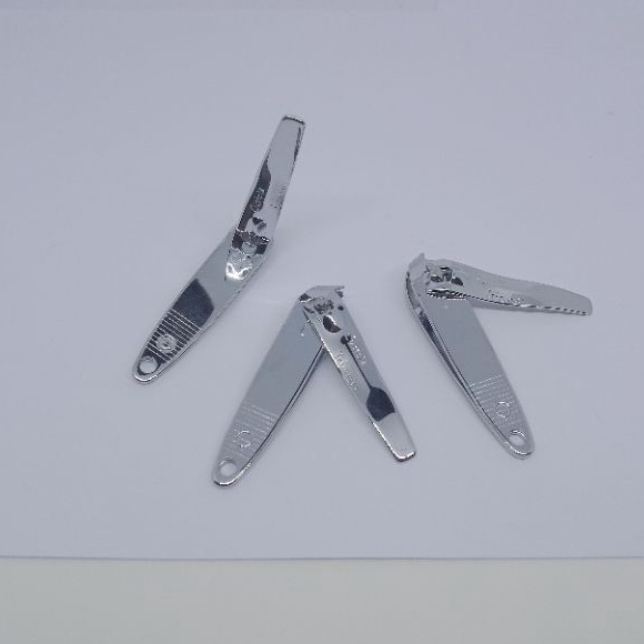 naim_surya_asemka_gunting kuku miring satuan