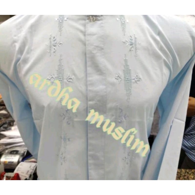 Baju Koko Kerancang Padang Tangan Panjang Putih