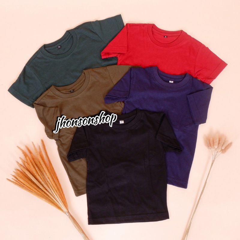 kaos oblong polos anak-anak cwe/cwo catton combat bahan adem dan enak dipakai. buat usia 2-11