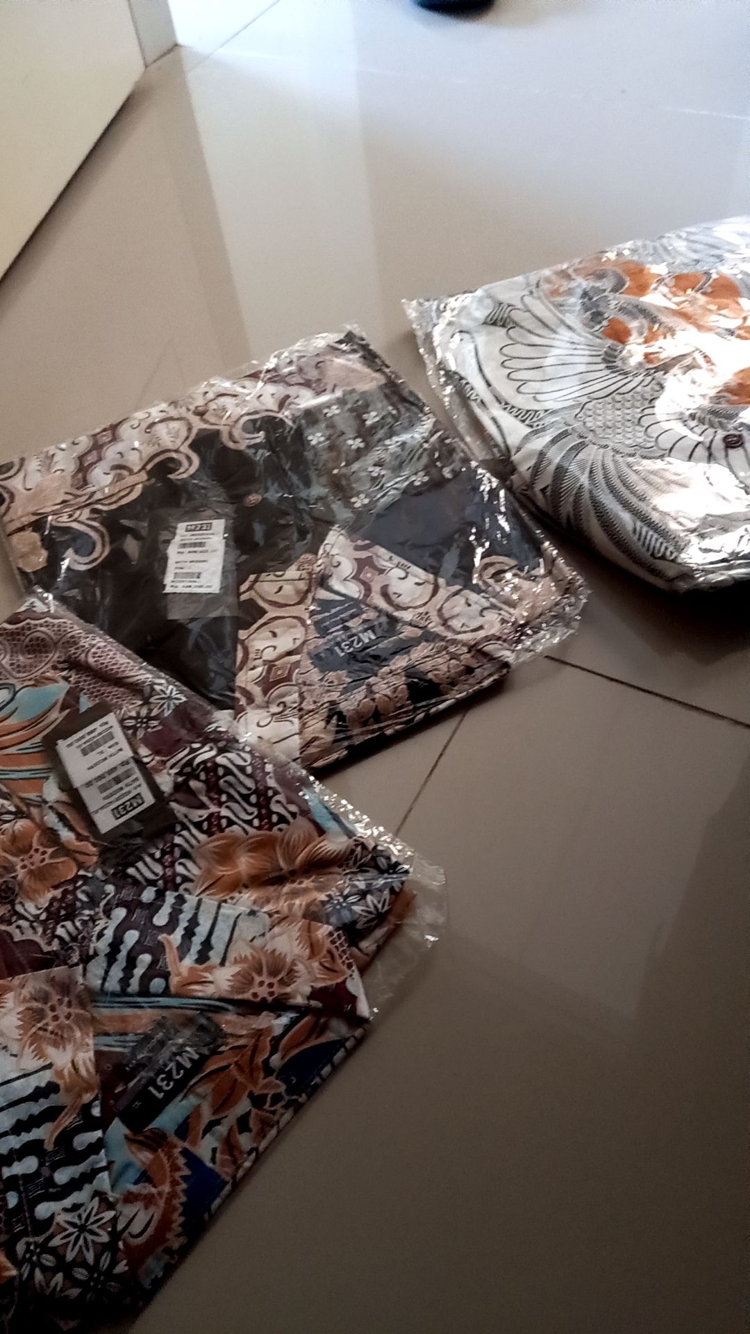 M231 Kemeja Pria Batik Panjang Coklat 1423a