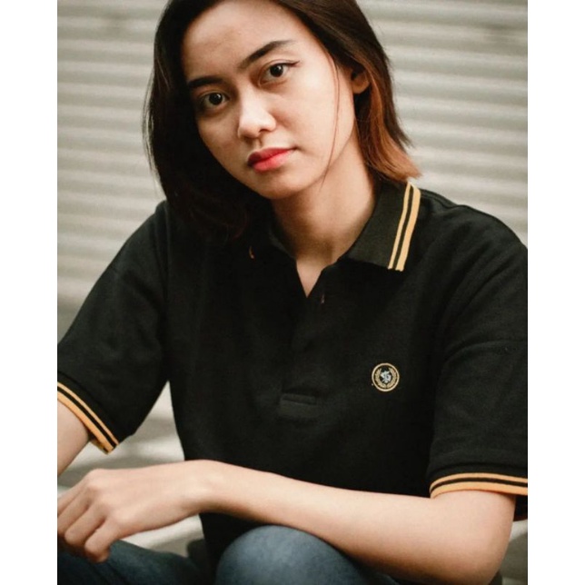 Polo hitam Persebaya