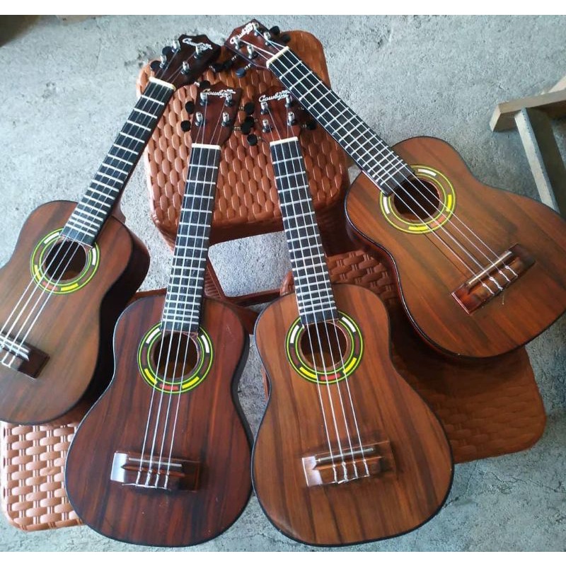 ukulele motip sono keling senar 4 bonus tas dan pick