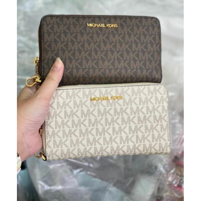 dompet mk jet set phone