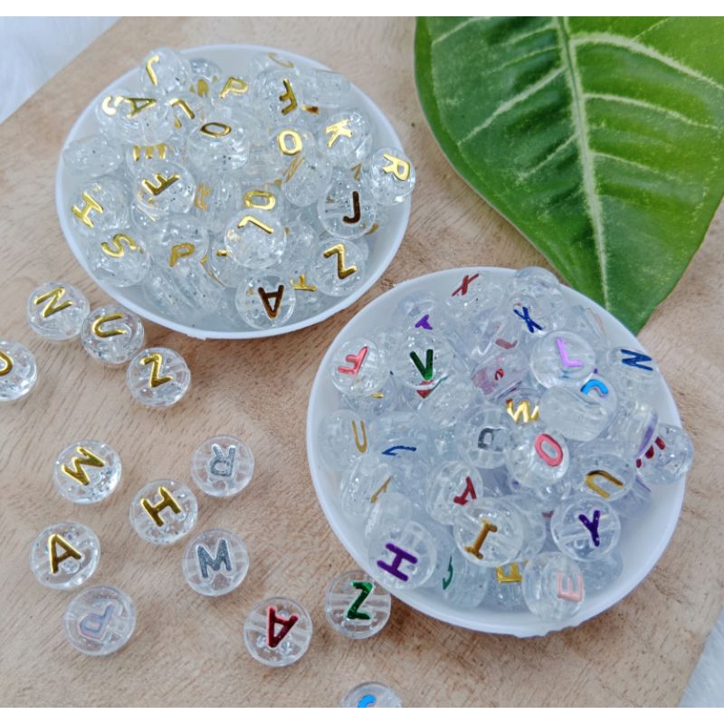 Manik Mote Huruf Transparan Bulat Pipih Ukuran 10mm