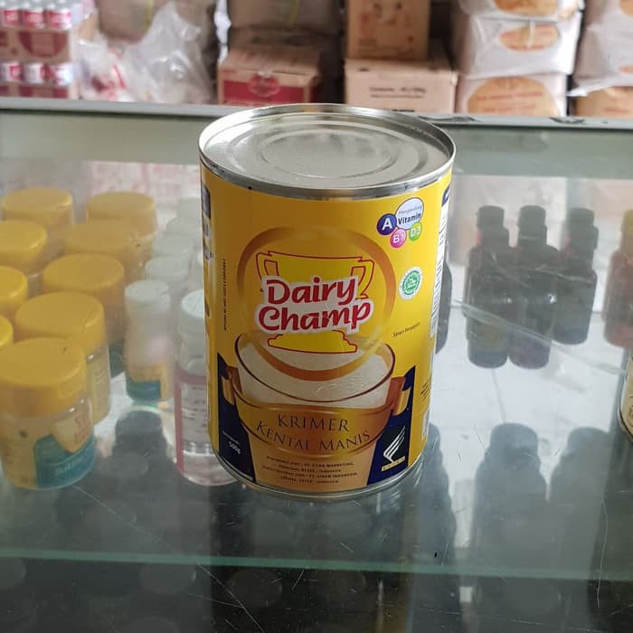 

Susu Kaleng Kental Manis Dairy Champ 500g