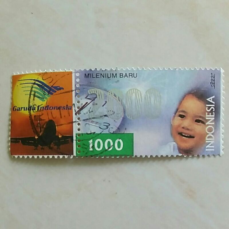 

(AA) Perangko Prisma Milenium Baru - Garuda Indonesia Tahun 2000 Used